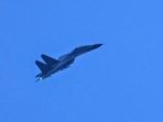 A Chinese military jet flies over Pingtan island, one of mainland China's closest points to Taiwan, in Fujian province. A Chinese military jet flies over Pingtan island, one of mainland China's closest points to Taiwan, in Fujian province.