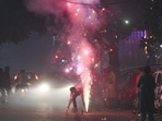 People burst fire crackers on Diwali in New Delhi. (Sanchit Khanna/HT Photo) People burst fire crackers on Diwali in New Delhi. (Sanchit Khanna/HT Photo)