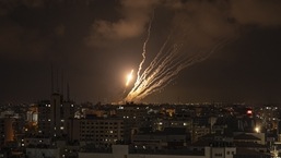Rockets fired by Palestinian militants toward Israel, in Gaza City, Saturday, 