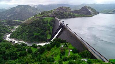 One shutter of the Cheruthoni dam of Idukki reservoir in Kerala was raised by 70 centimetres on Sunday to discharge excess water from the dam after the water level reached 2384.10 feet in the morning. (PTI) One shutter of the Cheruthoni dam of Idukki reservoir in Kerala was raised by 70 centimetres on Sunday to discharge excess water from the dam after the water level reached 2384.10 feet in the morning. (PTI)