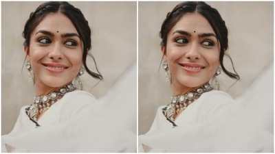 Mrunal added more ethnic vibes to her look with a white cotton dupatta featuring black cotton thread details and mirror details at the borders. (Instagram/@mrunalthakur)
