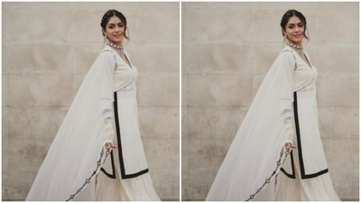 Mrunal wore her tresses into a messy bun with braid details and a middle part. (Instagram/@mrunalthakur)