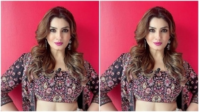 Raveena looked ethereal in a co-ord set from the shelves of fashion designer house Chamee and Palak. The actor decked up in a black blouse that came intricately embroidered in shades of multicolours. (Instagram/@officialraveenatandon)