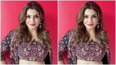 In silver statement earrings from the shelves of Sangeeta Boochra and wavy tresses left open, Raveena decked up in nude eyeshadow, black eyeliner, black kohl, mascara-laden eyelashes, drawn eyebrows, contoured cheeks and a shade of bright pink lipstick. (Instagram/@officialraveenatandon)