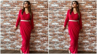 Raveena’s full-sleeved gown featured wrap details in one shoulder and put together with a silver belt at the waist. The gown hugged Raveena’s shape and showed off her curves. (Instagram/@officialraveenatandon)