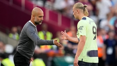 Pep Guardiola with Erling Haaland (AP) Pep Guardiola with Erling Haaland (AP)