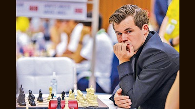 Chess World Champion Magnus Carlsen in action during Round 4 of the 44th Chess Olympiad, at Mamallapuram near Chennai, Monday. (PTI) Chess World Champion Magnus Carlsen in action during Round 4 of the 44th Chess Olympiad, at Mamallapuram near Chennai, Monday. (PTI)