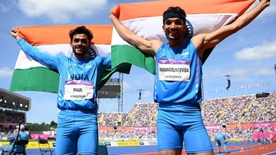 Gold medalist Eldhose Paul (left) and and silver medalist Abdulla Aboobacker.&nbsp; (Getty)