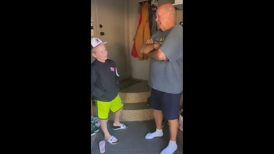 A screengrab from the viral video that shows a boy giving a surprise to his grandpa after his first home run in Baseball. (Instagram/@carrierdamon) A screengrab from the viral video that shows a boy giving a surprise to his grandpa after his first home run in Baseball. (Instagram/@carrierdamon)