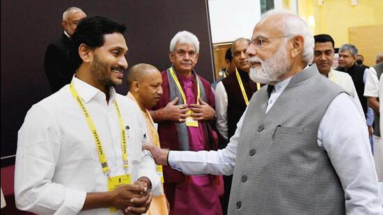 Prime Minister Narendra Modi interacts with Andhra Pradesh CM YS Jaganmohan Reddy at the 7th Governing Council meeting of NITI Aayog at Rashtrapati Bhawan Cultural Centre, in New Delhi on Sunday. (PTI PHOTO.)