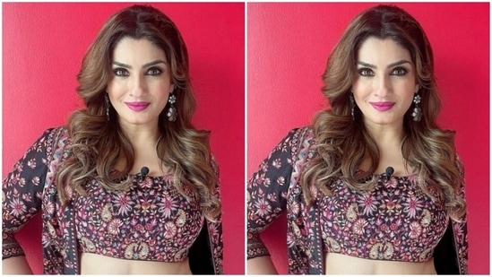In silver statement earrings from the shelves of Sangeeta Boochra and wavy tresses left open, Raveena decked up in nude eyeshadow, black eyeliner, black kohl, mascara-laden eyelashes, drawn eyebrows, contoured cheeks and a shade of bright pink lipstick.(Instagram/@officialraveenatandon)