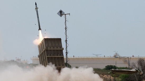An Israeli Iron Dome air defence system launches a missile to intercept rockets fired from the Gaza Strip, on the outskirts of the southern Israeli city of Ashkelon.(AFP) An Israeli Iron Dome air defence system launches a missile to intercept rockets fired from the Gaza Strip, on the outskirts of the southern Israeli city of Ashkelon.(AFP)