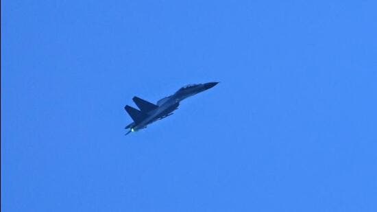 A Chinese military jet flies over Pingtan island, one of mainland China's closest points to Taiwan, in Fujian province on Saturday. Taiwan accused the Chinese army of simulating an attack on its main island on Saturday, as Beijing continued its retaliation for US House Speaker Nancy Pelosi's Taipei visit. (AFP)