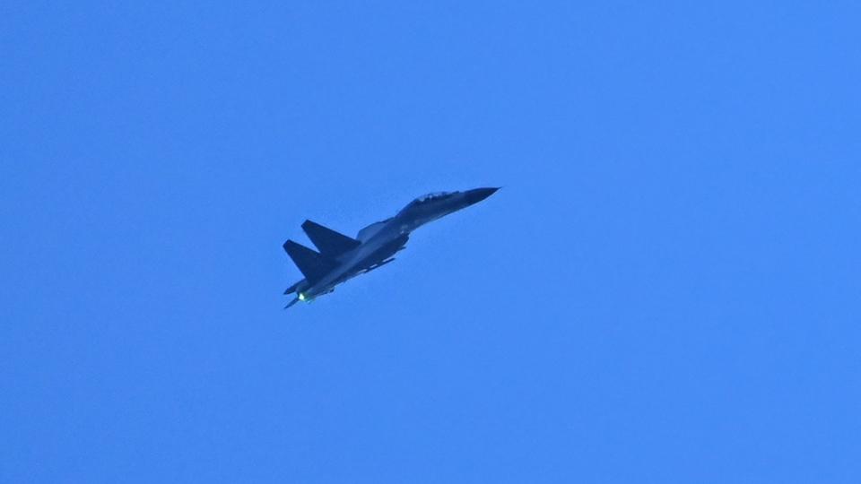 A Chinese military jet flies over Pingtan island, one of mainland China's closest points to Taiwan, in Fujian province. (AFP) A Chinese military jet flies over Pingtan island, one of mainland China's closest points to Taiwan, in Fujian province. (AFP)