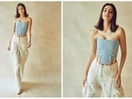 Ananya Panday takes street style to a whole new level as she attends a promotional event of her upcoming film Liger in a blue strapless crop corset top and high-rise baggy cargo pants.(Instagram/@spacemuffin27) Ananya Panday takes street style to a whole new level as she attends a promotional event of her upcoming film Liger in a blue strapless crop corset top and high-rise baggy cargo pants.(Instagram/@spacemuffin27)