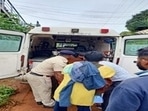 The injured woman being taken to hospital by RPF staff. (Image source: RPF S.W.Railway/Twitter) The injured woman being taken to hospital by RPF staff. (Image source: RPF S.W.Railway/Twitter)