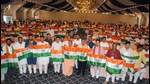 Chief minister Yogi Adityanath and others showing Tricolour for the door-to-door campaign at the closing ceremony of BJYM's training camp, in Agra on Monday. (AGENCY) Chief minister Yogi Adityanath and others showing Tricolour for the door-to-door campaign at the closing ceremony of BJYM's training camp, in Agra on Monday. (AGENCY)