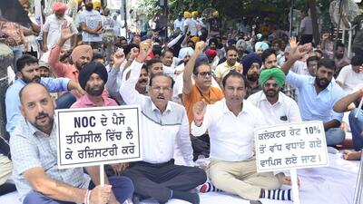 Colonisers and property dealer’s association members to protest outside tehsil office in Ludhiana on Monday. (Harvinder Singh/HT)