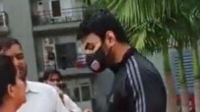 Shrikant Tyagi, who claimed to be a leader of the BJP, was booked by the Noida police after he was seen using abusive language at a resident of his apartment block in Noida. (Video/Screen grab) Shrikant Tyagi, who claimed to be a leader of the BJP, was booked by the Noida police after he was seen using abusive language at a resident of his apartment block in Noida. (Video/Screen grab)