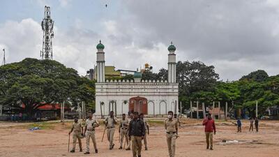 Police personnel deployed at the Idgah Maidan in Chamrajpet (HT Photo) Police personnel deployed at the Idgah Maidan in Chamrajpet (HT Photo)