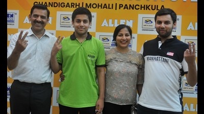 Saarth Singla celebrating his success with his family in Chandigarh on Monday. (Ravi Kumar/HT) Saarth Singla celebrating his success with his family in Chandigarh on Monday. (Ravi Kumar/HT)
