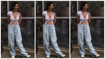 On Sunday, Disha stepped out in Mumbai with Ek Villain Returns director Mohit Suri and the paparazzi clicked the star outside a restaurant. She chose the classic white top and denim combination for the occasion. She added a fashionable twist to this good ol' style statement by incorporating Gen-Z style trends. (HT Photo/Varinder Chawla) On Sunday, Disha stepped out in Mumbai with Ek Villain Returns director Mohit Suri and the paparazzi clicked the star outside a restaurant. She chose the classic white top and denim combination for the occasion. She added a fashionable twist to this good ol' style statement by incorporating Gen-Z style trends. (HT Photo/Varinder Chawla)