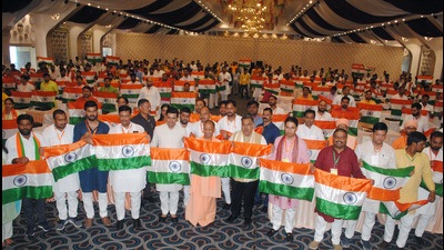 Chief minister Yogi Adityanath and others showing Tricolour for the door-to-door campaign at the closing ceremony of BJYM's training camp, in Agra on Monday. (AGENCY) Chief minister Yogi Adityanath and others showing Tricolour for the door-to-door campaign at the closing ceremony of BJYM's training camp, in Agra on Monday. (AGENCY)