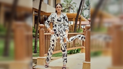 Huma Qureshi elevated her look with elegant pieces of jewellery that comprise a big gold chain choker and stud earrings. (Instagram/@iamhumaq)