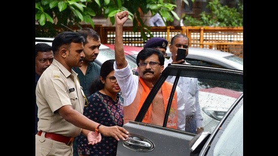 Shiv Sena MP Sanjay Raut waves to his supporters before being taken for production before a special court after his ED custody came to an end on Monday (HT Photo/Bhushan Koyande) Shiv Sena MP Sanjay Raut waves to his supporters before being taken for production before a special court after his ED custody came to an end on Monday (HT Photo/Bhushan Koyande)