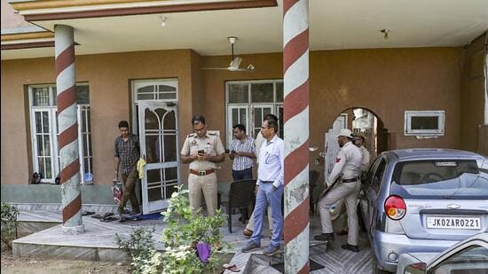 National Investigation Agency officials during a raid in Bathindi area of Jammu district on Monday. (PTI)