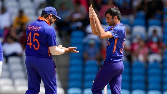 India's Ravi Bishnoi (R) celebrates a wicket with Rohit Sharma(AP) India's Ravi Bishnoi (R) celebrates a wicket with Rohit Sharma(AP)