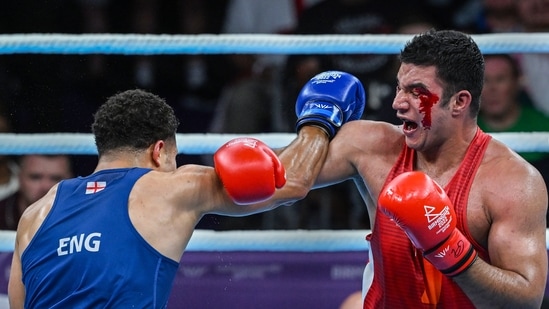 Boxer Sagar Ahlawat (in red) during his bout against England's Delicious Orie in the final of 92kg (Super Heavyweight) boxing match, at the Commonwealth Games 2022 in Birmingham, UK, Sunday, Aug 7, 2022. Sagar won the silver medal.(PTI)
