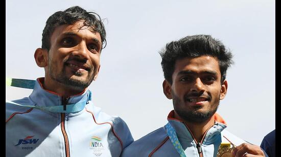 Men's triple jump gold medalist Eldhose Paul and silver medalist Abdulla Aboobacker Narangolintevida (L), Birmingham on August 6, 2022 (ANI)