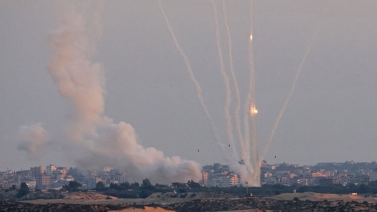 This picture taken from the southern Israeli city of Ashkelon shows Palestinian rockets fired from the Gaza Strip on August 7, 2022. (Photo by JACK GUEZ/AFP)