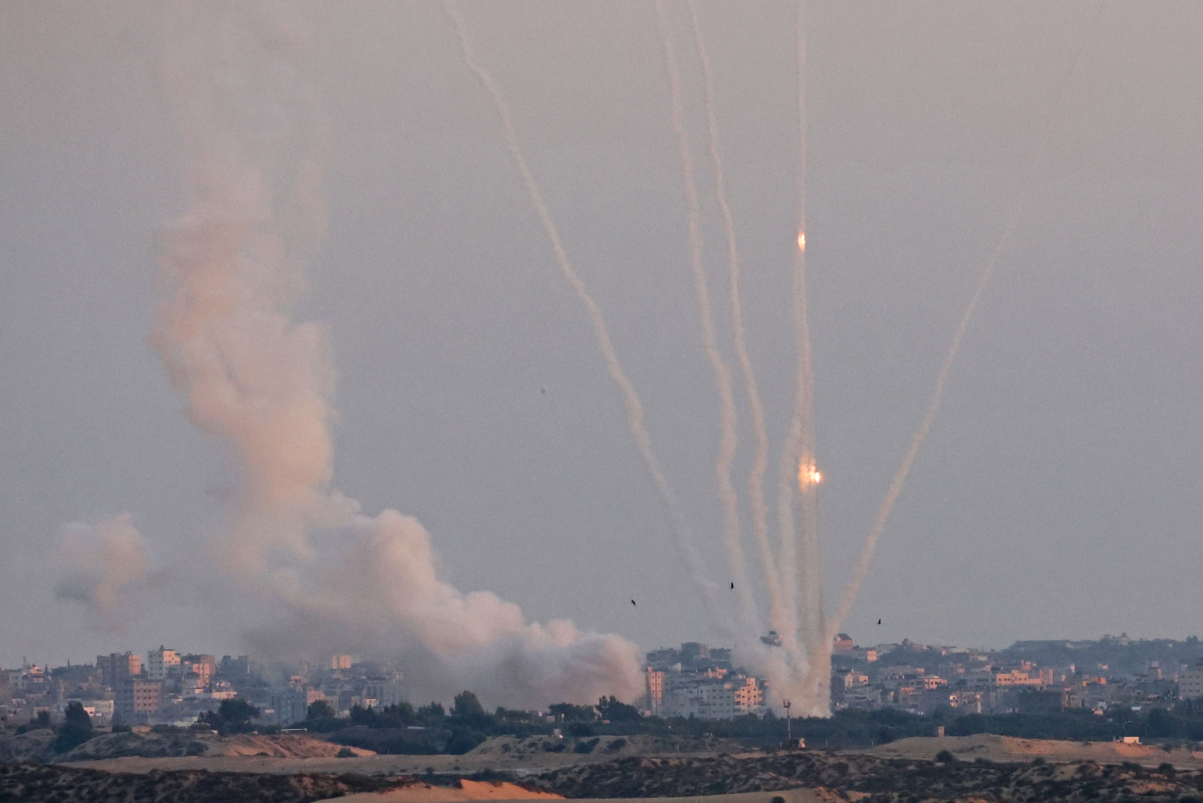 This picture taken from the southern Israeli city of Ashkelon shows Palestinian rockets fired from the Gaza Strip on August 7, 2022. (Photo by JACK GUEZ/AFP) This picture taken from the southern Israeli city of Ashkelon shows Palestinian rockets fired from the Gaza Strip on August 7, 2022. (Photo by JACK GUEZ/AFP)