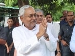 Nitish Kumar with RJD leaders Tejashwi Yadav and his brother Tej Pratap. Nitish Kumar with RJD leaders Tejashwi Yadav and his brother Tej Pratap. 