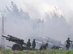 Soldiers fire 155mm howitzers during an annual live fire military exercise in Pingtung county, southern Taiwan August 9, 2022. Soldiers fire 155mm howitzers during an annual live fire military exercise in Pingtung county, southern Taiwan August 9, 2022. 