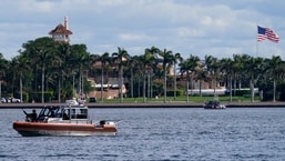 A security boat patrols near Mar-a-Lago Florida Resort in West Palm Beach.