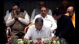 BJP leader Chandrakant Patil from Pune takes oath as Maharashtra minister, in Mumbai on Tuesday. (Satish Bate/HT PHOTO)