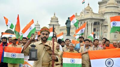 Postal employees take part in a Tiranga Yatra as part of the 'Har Ghar Tiranga' campaign as part of Azadi Ki Amrit Mahotsav, in Bengaluru on Monday. (ANI) Postal employees take part in a Tiranga Yatra as part of the 'Har Ghar Tiranga' campaign as part of Azadi Ki Amrit Mahotsav, in Bengaluru on Monday. (ANI)