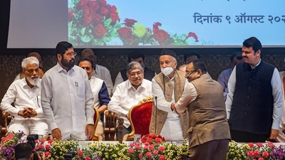Mumbai: Maharashtra Governor Bhagat Singh Koshyari congratulates Sudhir Mungantiwar after he was sworn-in as a minister, at Raj Bhavan in Mumbai. (PTI) Mumbai: Maharashtra Governor Bhagat Singh Koshyari congratulates Sudhir Mungantiwar after he was sworn-in as a minister, at Raj Bhavan in Mumbai. (PTI)