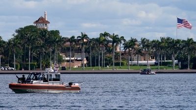 A security boat patrols near Mar-a-Lago Florida Resort in West Palm Beach. (AP / File)