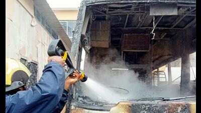 A school bus parked in the premises of a Hadapsar school caught fire on Tuesday morning (HT PHOTO)