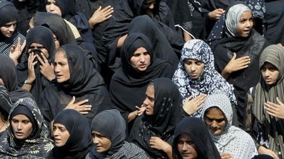 The Shia community marks the tenth day of Muharram by fasting, wearing primarily black, and participating in marches and processions. In the processions, one can hear people chanting "Ya Ali" and "Ya Hussain." (Bhopal) The Shia community marks the tenth day of Muharram by fasting, wearing primarily black, and participating in marches and processions. In the processions, one can hear people chanting "Ya Ali" and "Ya Hussain." (Bhopal)