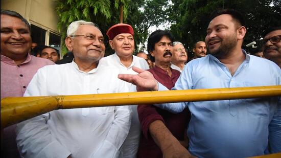 RJD leader Tejashwi Yadav and JD(U) leader Nitish Kumar in Patna on Tuesday. (Santosh Kumar/HT photo)