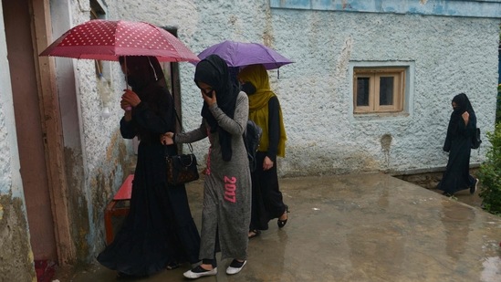 Girls arriving in a secret school at an undisclosed location in Afghanistan.(AFP) Girls arriving in a secret school at an undisclosed location in Afghanistan.(AFP)