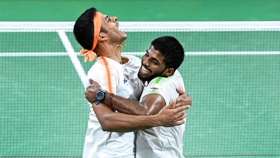 Birmingham: India's Satwiksairaj Rankireddy and Chirag Shetty celebrate after winning the Men's Doubles Final(PTI)