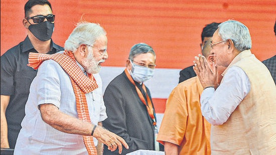 Prime Minister Narendra Modi with Bihar chief minister Nitish Kumar, in Lucknow on March 25. (PTI)