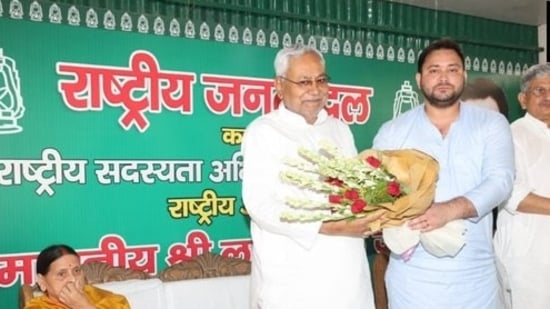 Nitish Kumar along with RJD leader Tejashwi Yadav.