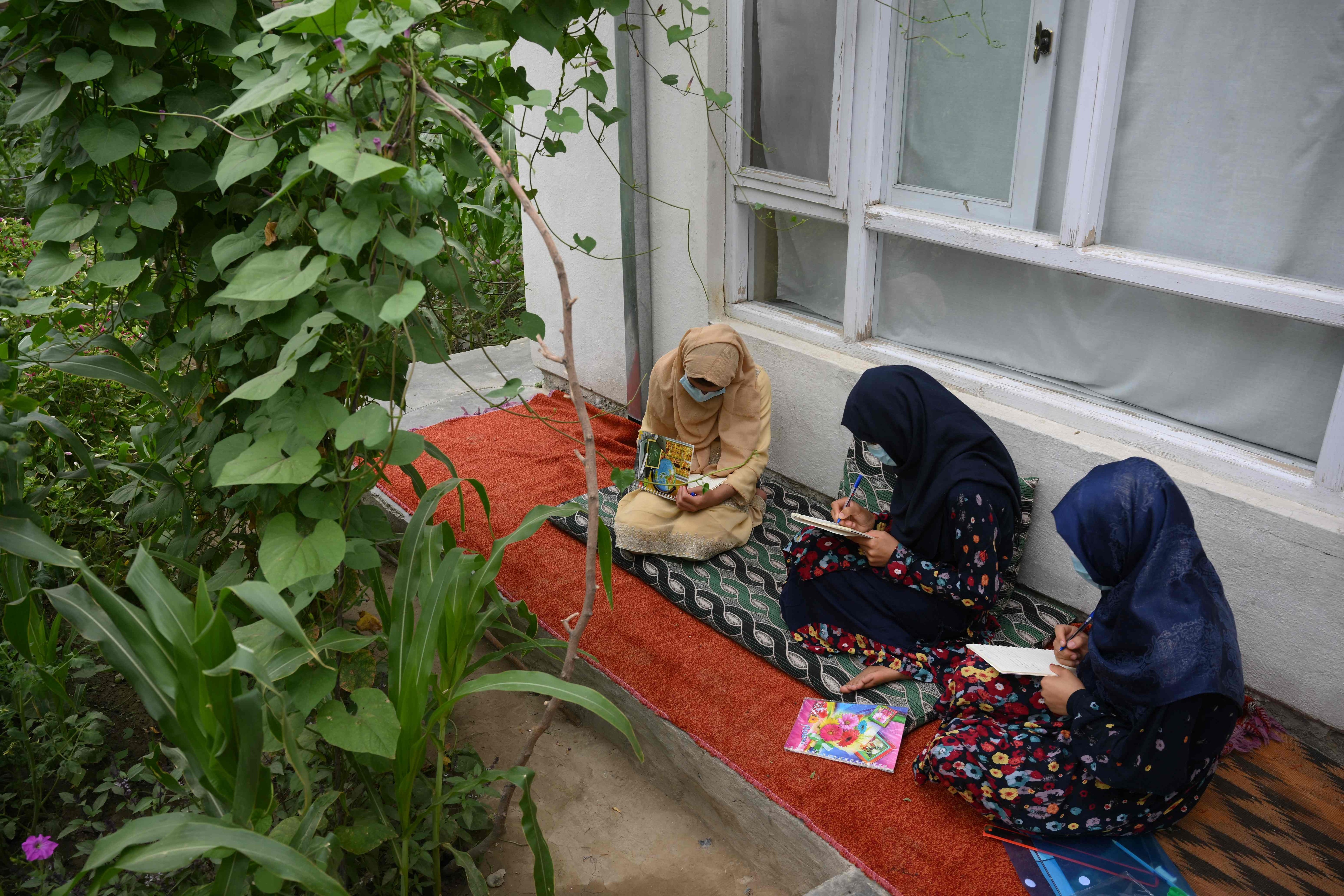 Since seizing power a year ago, the Taliban have imposed harsh restrictions on girls and women to comply with their austere vision of Islam -- effectively squeezing them out of public life. (AFP)